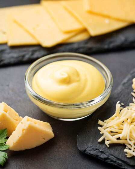 Homemade cheese sauce in glass bowl